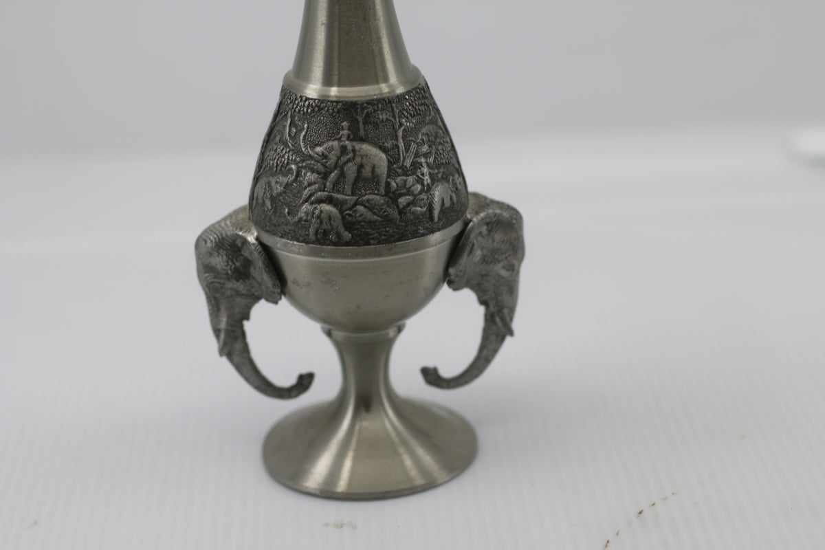 Thai vase in white metal decorated with elephant heads and friezes