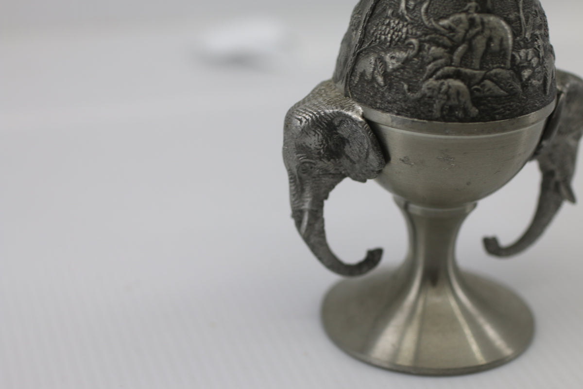 Thai vase in white metal decorated with elephant heads and friezes