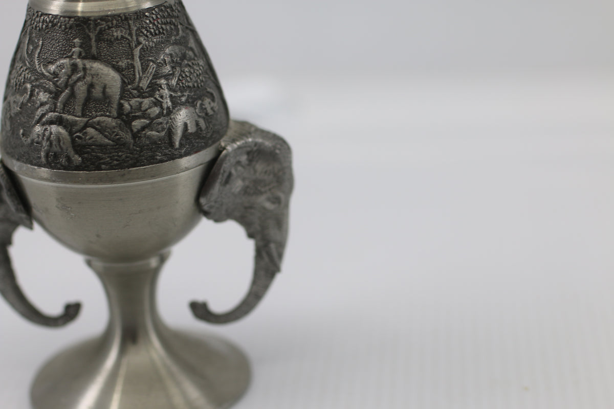 Thai vase in white metal decorated with elephant heads and friezes