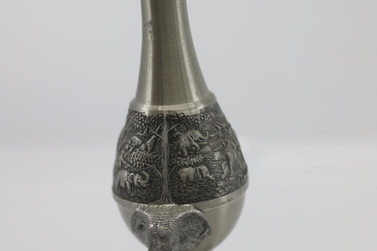 Thai vase in white metal decorated with elephant heads and friezes