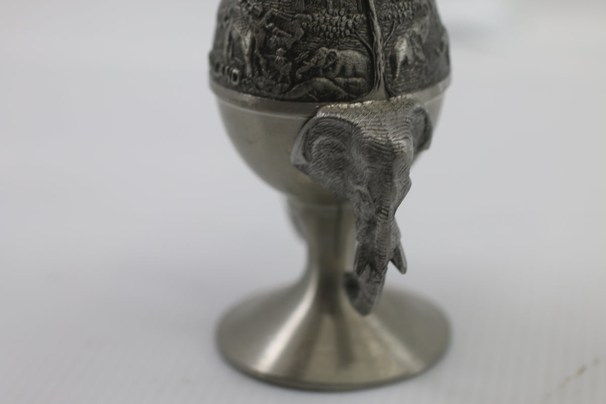 Thai vase in white metal decorated with elephant heads and friezes