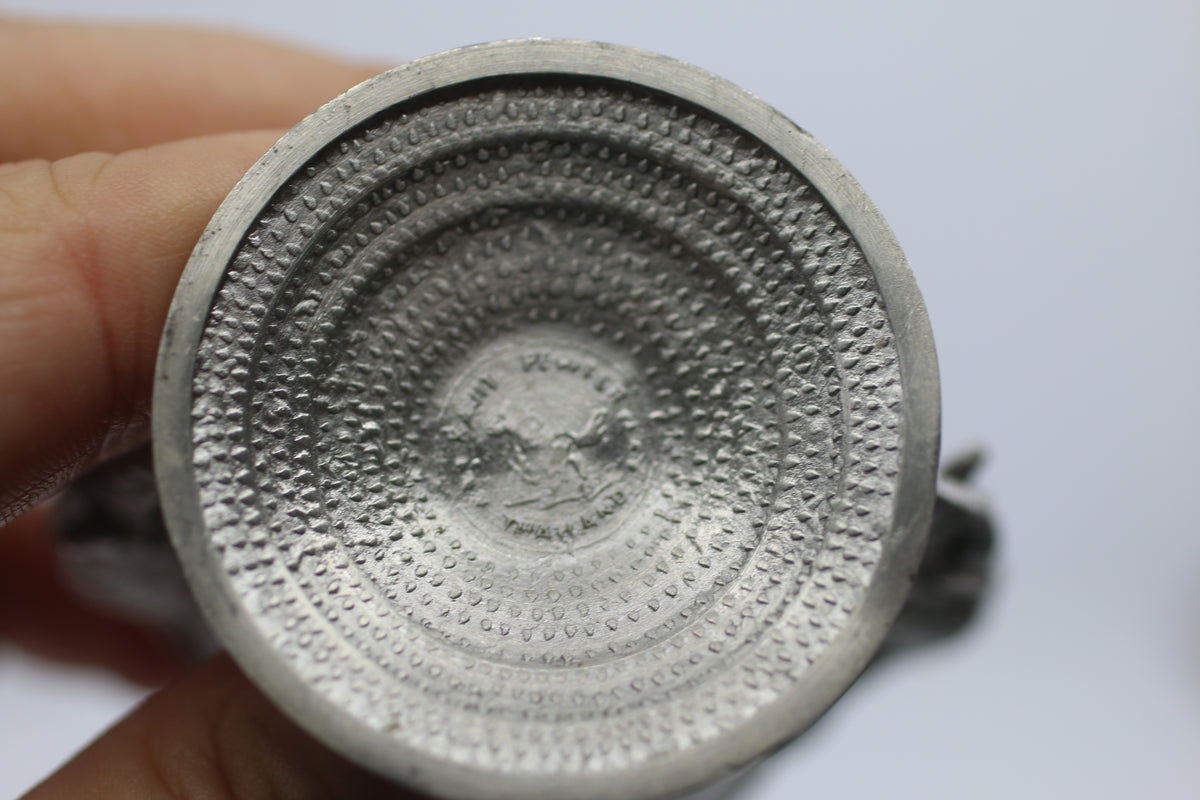 Thai vase in white metal decorated with elephant heads and friezes