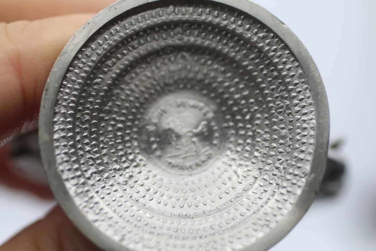 Thai vase in white metal decorated with elephant heads and friezes