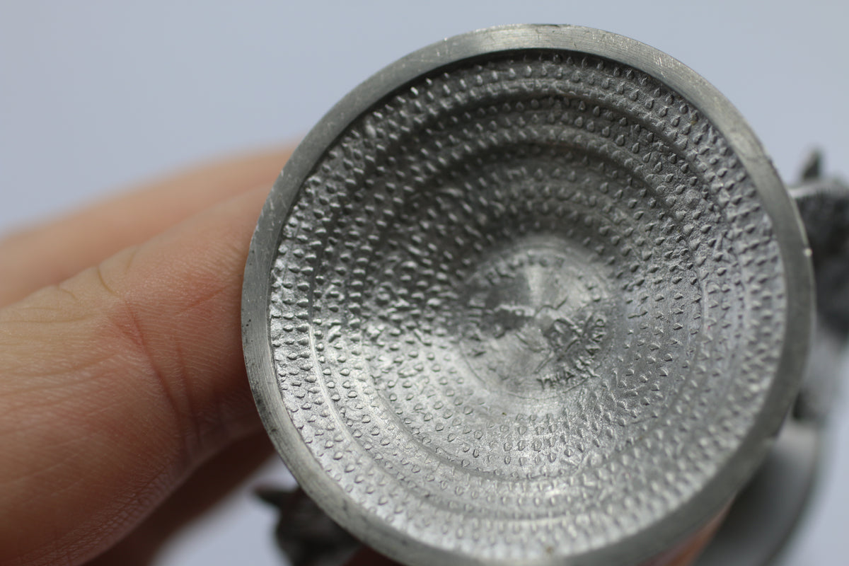 Thai vase in white metal decorated with elephant heads and friezes