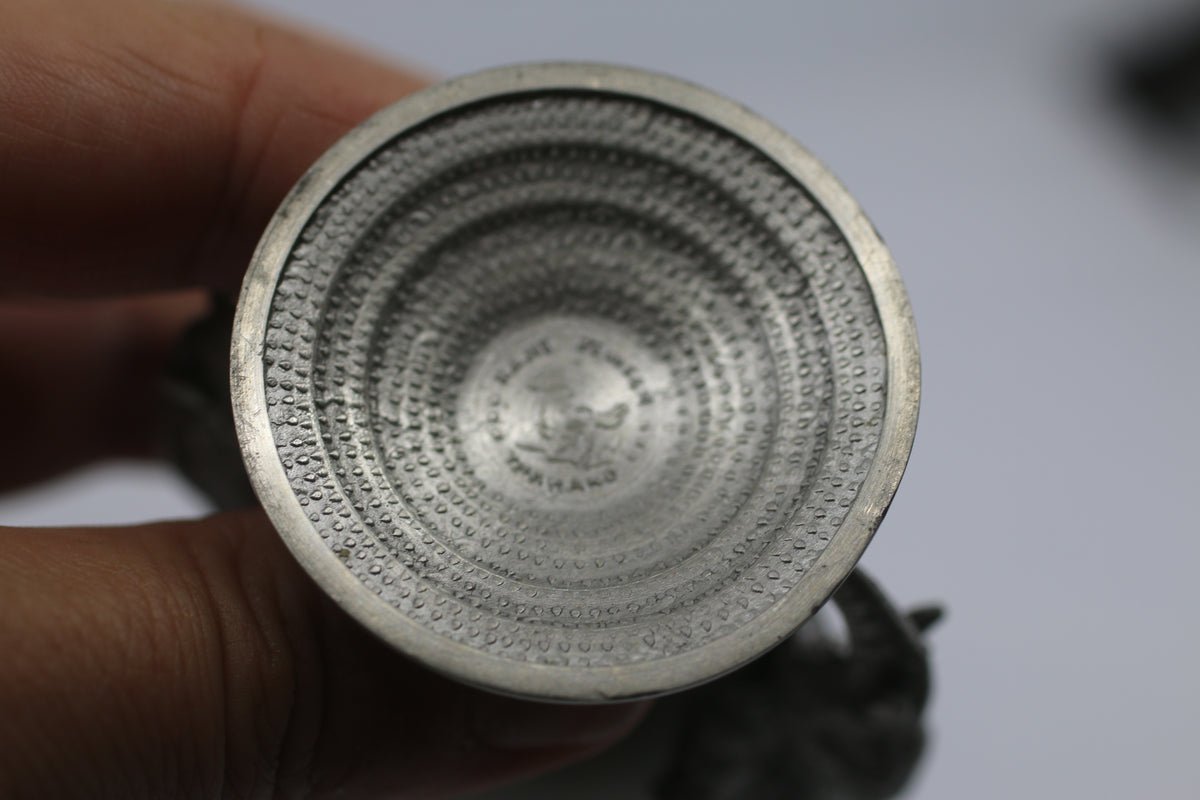 Thai vase in white metal decorated with elephant heads and friezes
