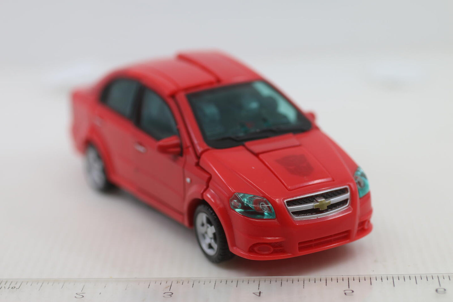 Transformers classic Universe Autobot Swerve Chevy Aveo Robot in disguise 2007
