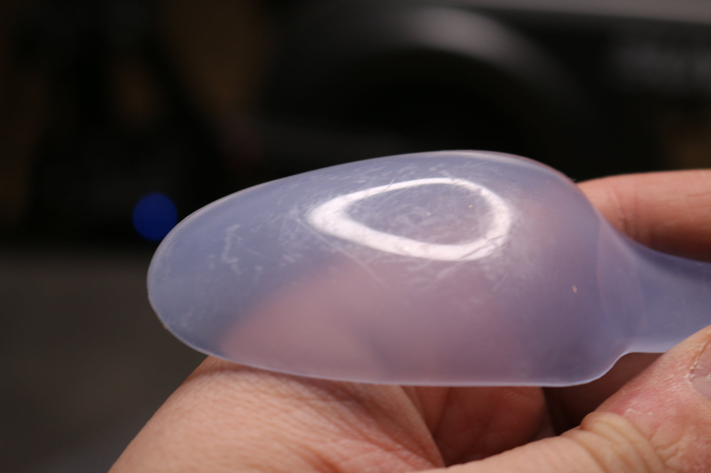 palm tree bowl microwave with a lot of spoons forks knifes plastics