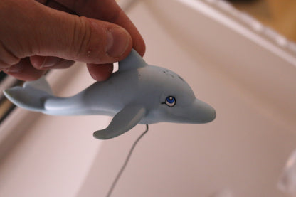 Dolphin animal rubber figure toy with cord
