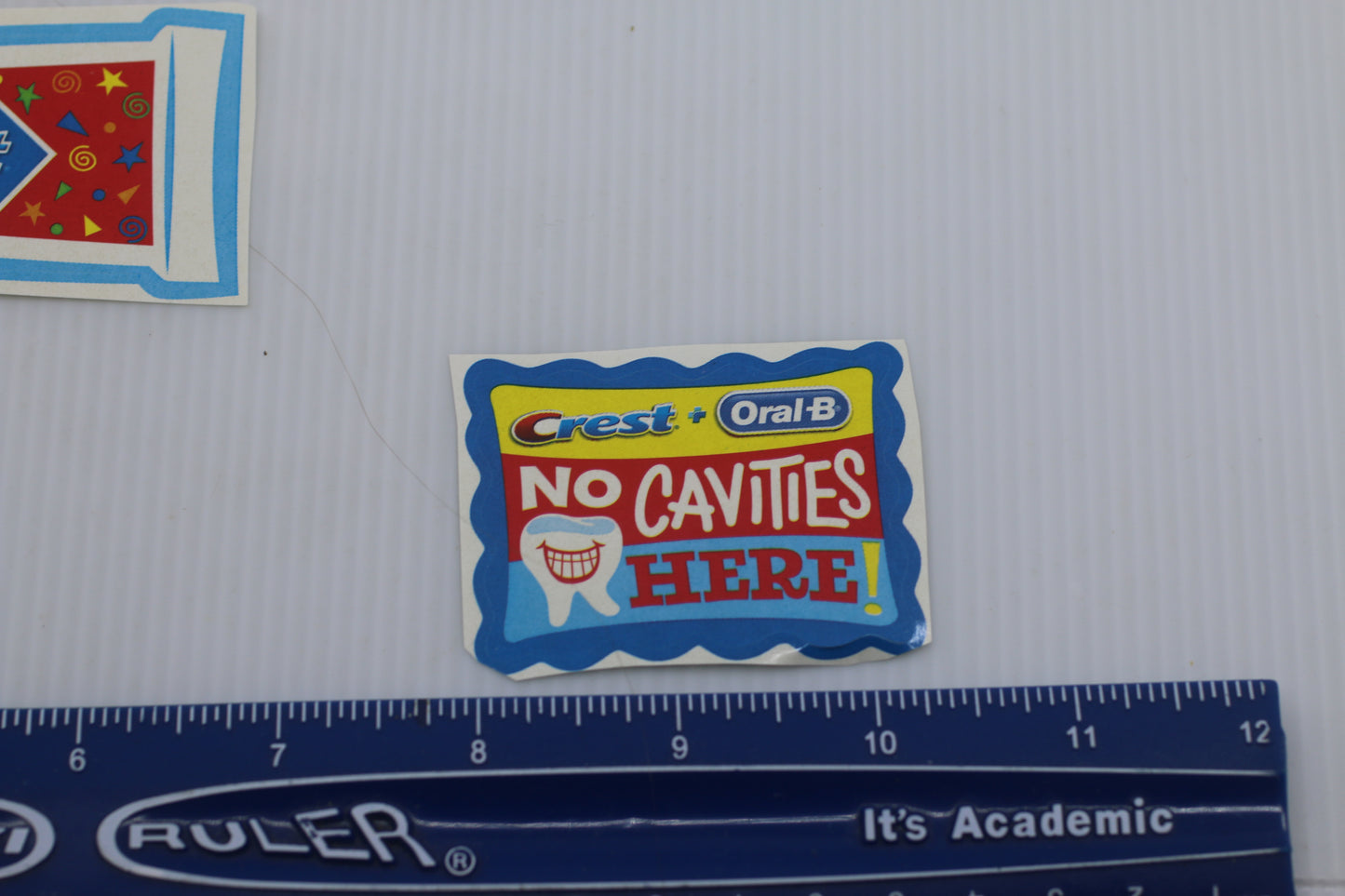 Sticker decal Crest tooth brush publicity No cavities here! auto-collat