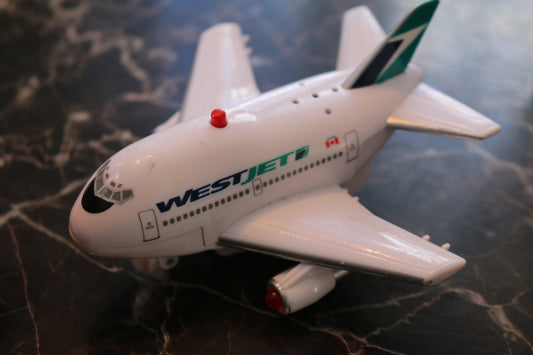west jet airplane Pull back toy mc japan 1995