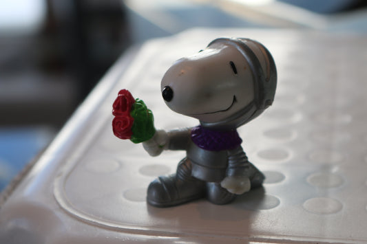 Snoopy holding Flowers dressed as a Knight in Armor Collectible PVC Figurine