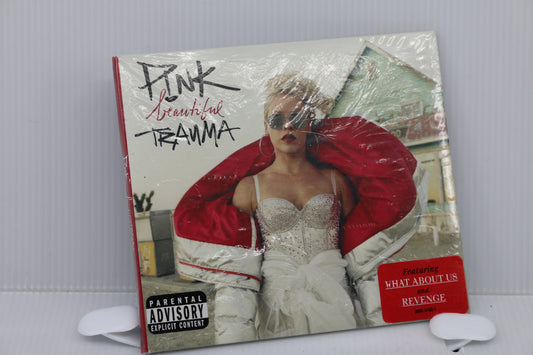 NEW & SEALED PINK BEAUTIFUL TRAUMA CD - WHAT ABOUT US - REVENGE - SECRETS .