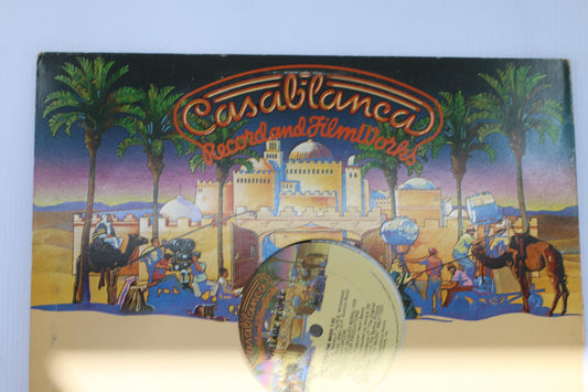A Casablanca Single 33⅓ RPM Vinyl Record and film work