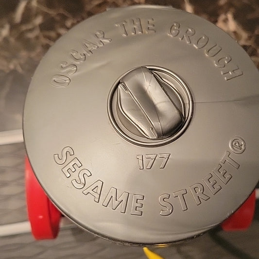 Fisher Price Vintage Oscar The Grouch #177 Squeeze Bulb/ Pop Up/ Pull Toy 1977