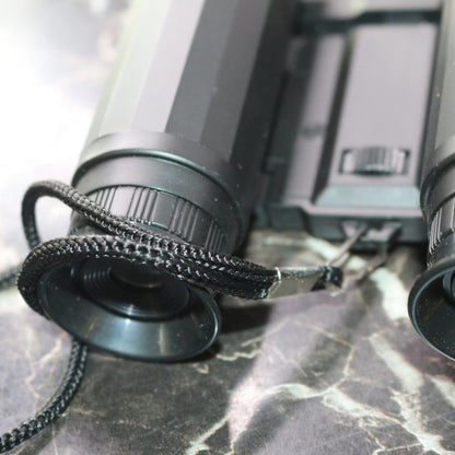 Small binoculars for kids or travel no trademark written w/ leather Storage case