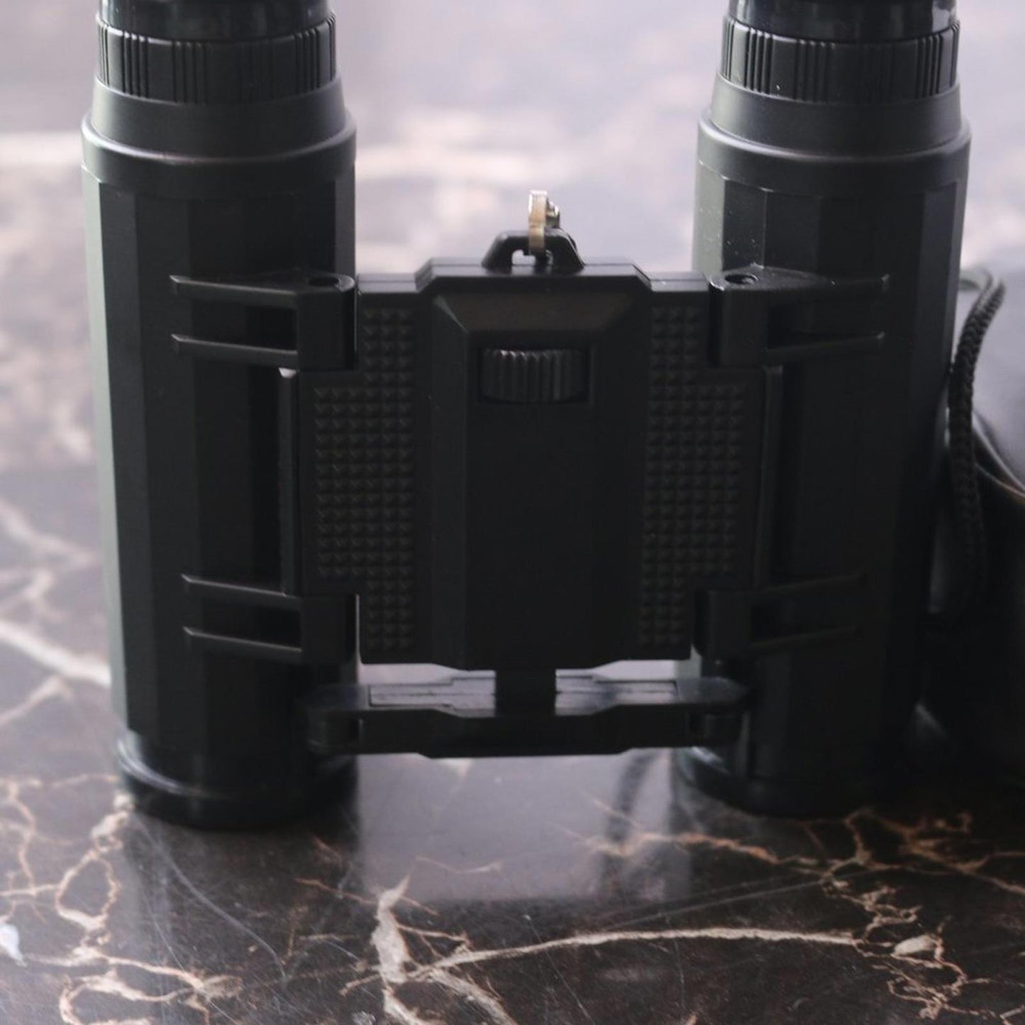 Small binoculars for kids or travel no trademark written w/ leather Storage case