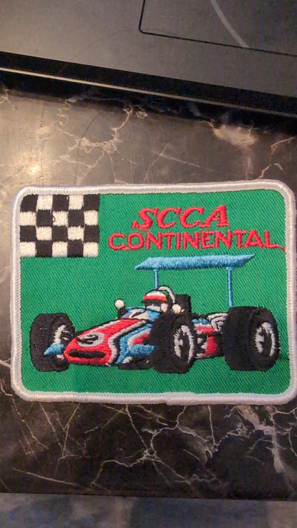 Vintage SCCA Continental Racing Patch with Race Car and Checkered Flag