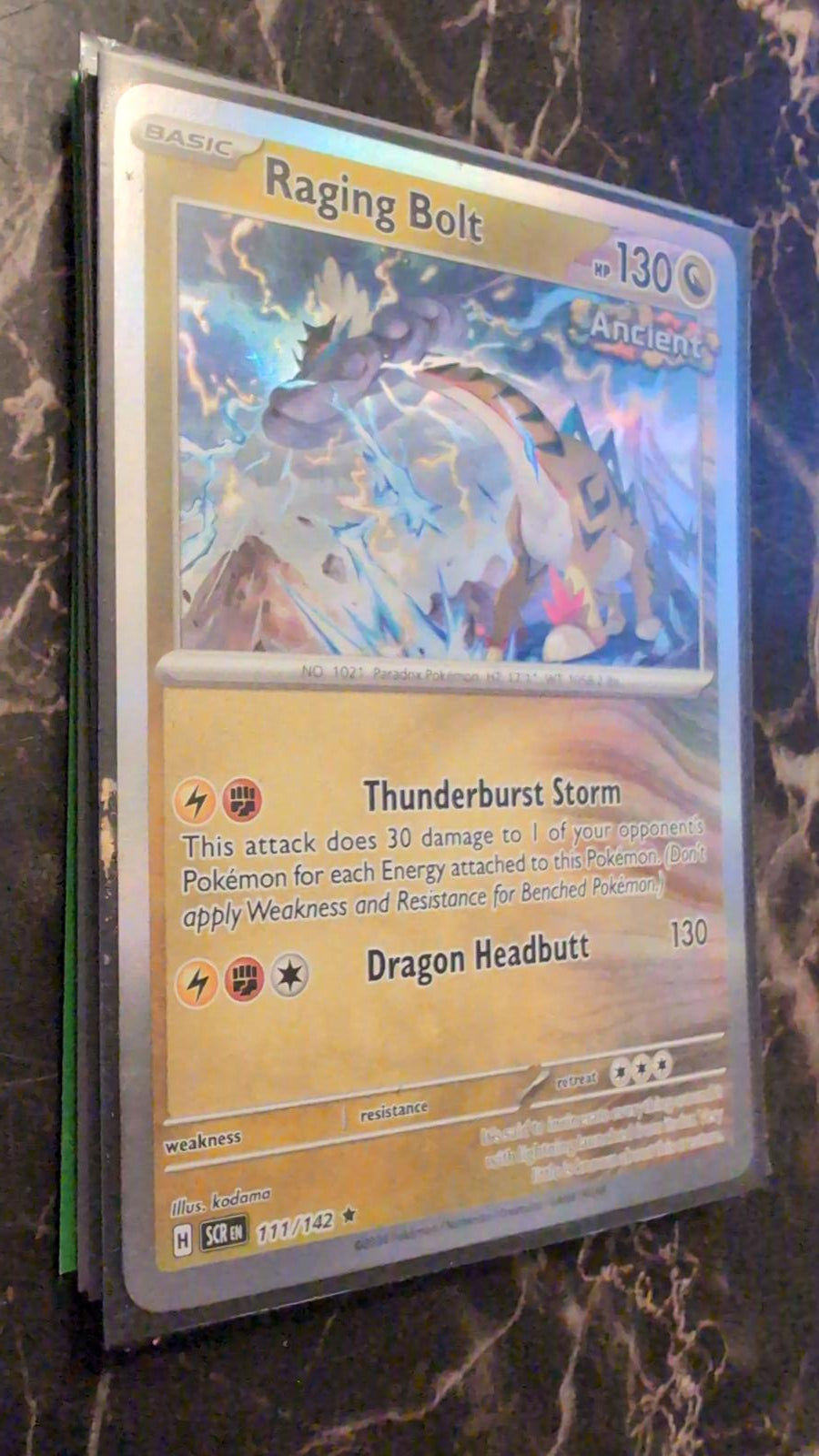 Raging Bolt 111/142 Pokemon Stellar Crown Scarlet & Violet Holo Rare Card NM