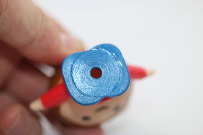 Small Plastic Figurine Toy with Brown Hair and Red Shirt