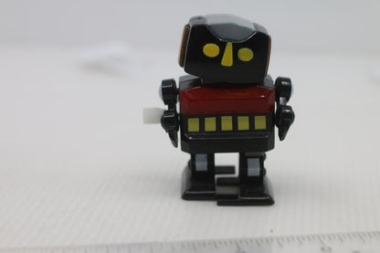 Vintage Wind-Up Robot Toy with Yellow and Red Details