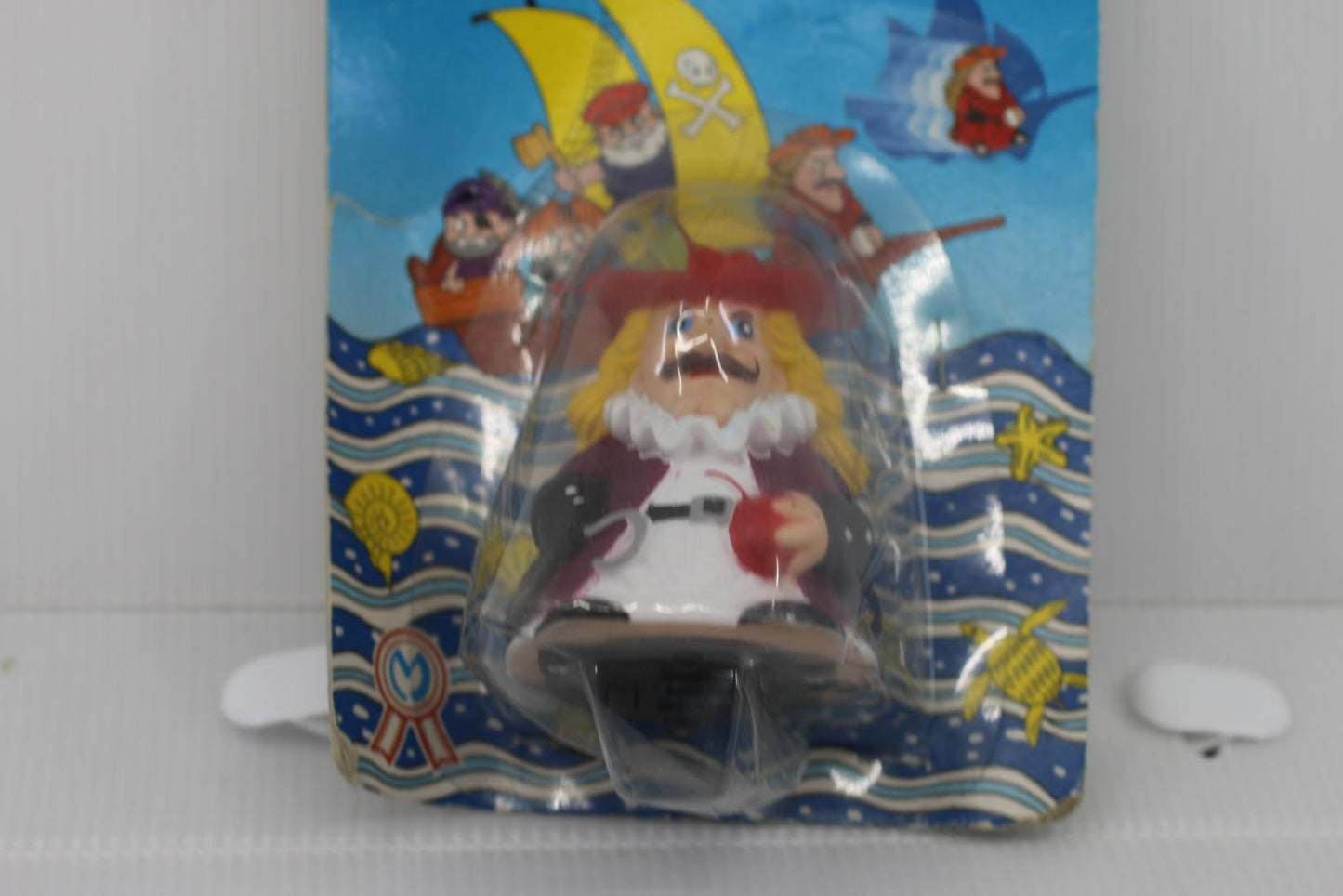 Vintage Rolling Pirate Friction Powered Toy figure toy on card
