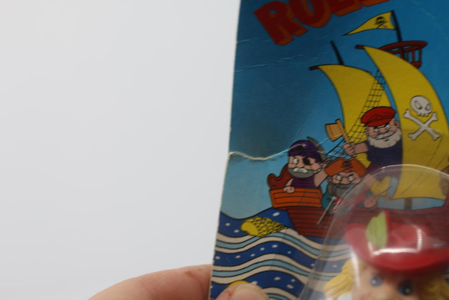Vintage Rolling Pirate Friction Powered Toy figure toy on card