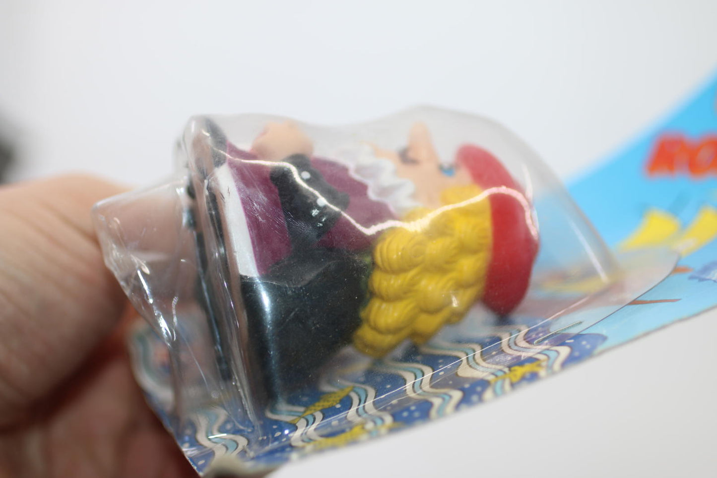 Vintage Rolling Pirate Friction Powered Toy figure toy on card