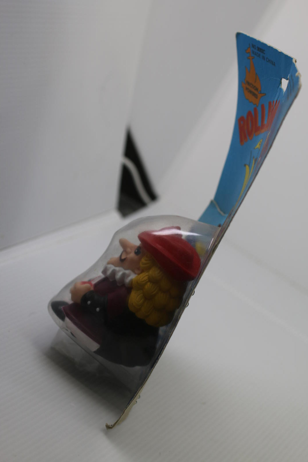 Vintage Rolling Pirate Friction Powered Toy figure toy on card