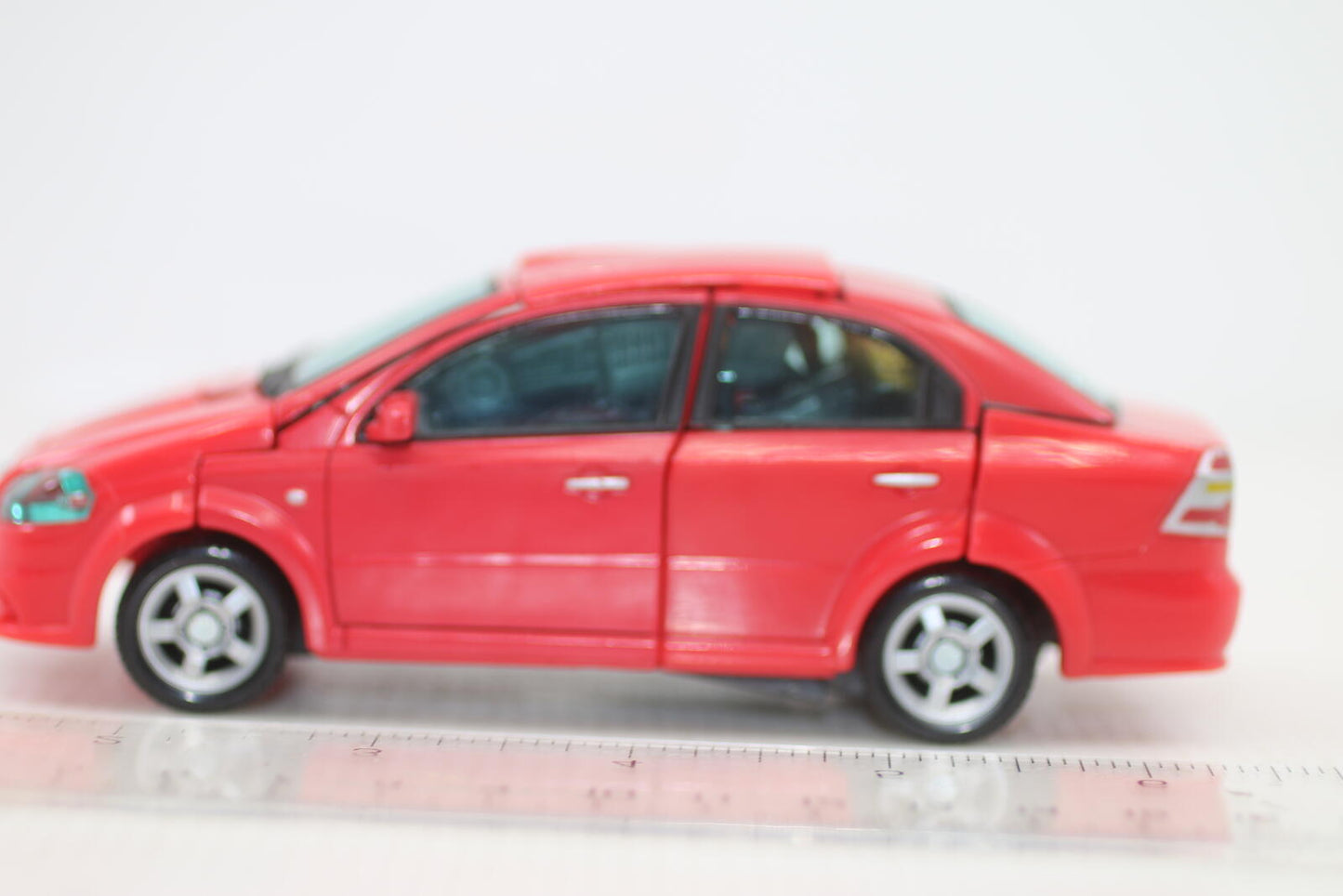 Transformers classic Universe Autobot Swerve Chevy Aveo Robot in disguise 2007