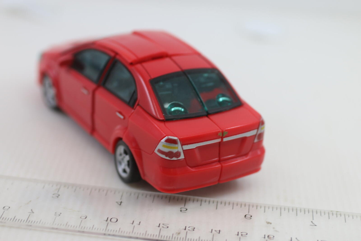Transformers classic Universe Autobot Swerve Chevy Aveo Robot in disguise 2007