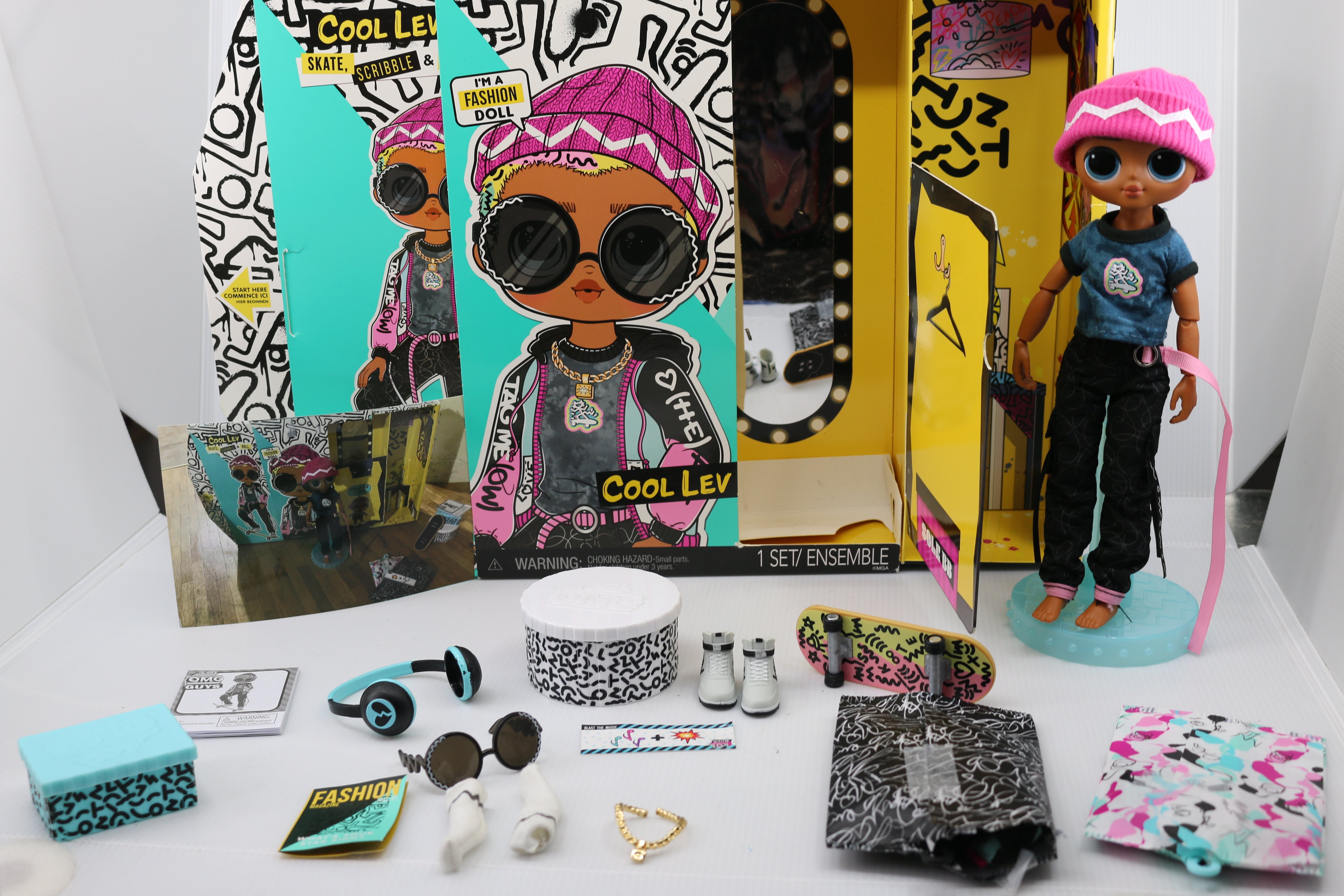L.O.L. Surprise OMG Guys Fashion Doll Cool Lev with 20 Surprises Set Omniphustoys