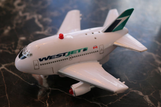 west jet airplane Pull back toy mc japan 1995