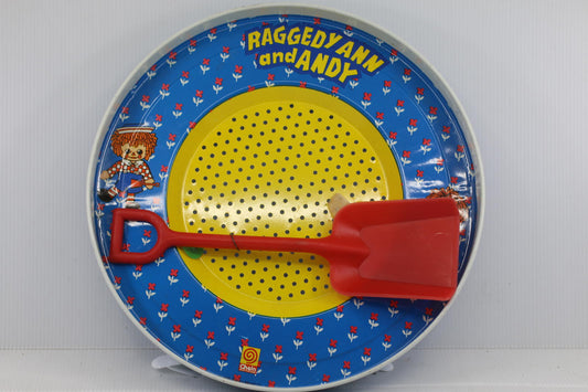 Vintage Raggedy Ann and Andy Metal Sifter with Red Plastic Shovel