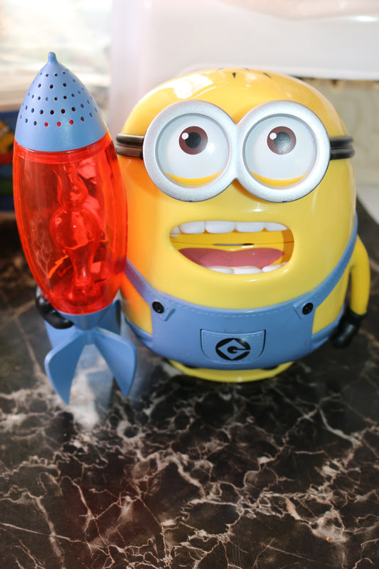 Tech 4 Kids DESPICABLE ME Starlite Pals Singing Minion Toy Rocket Colored Lights