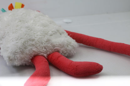 Plush Stuffed Toy with Long Red Limbs and Smiling Face Les Monstres à Câlins