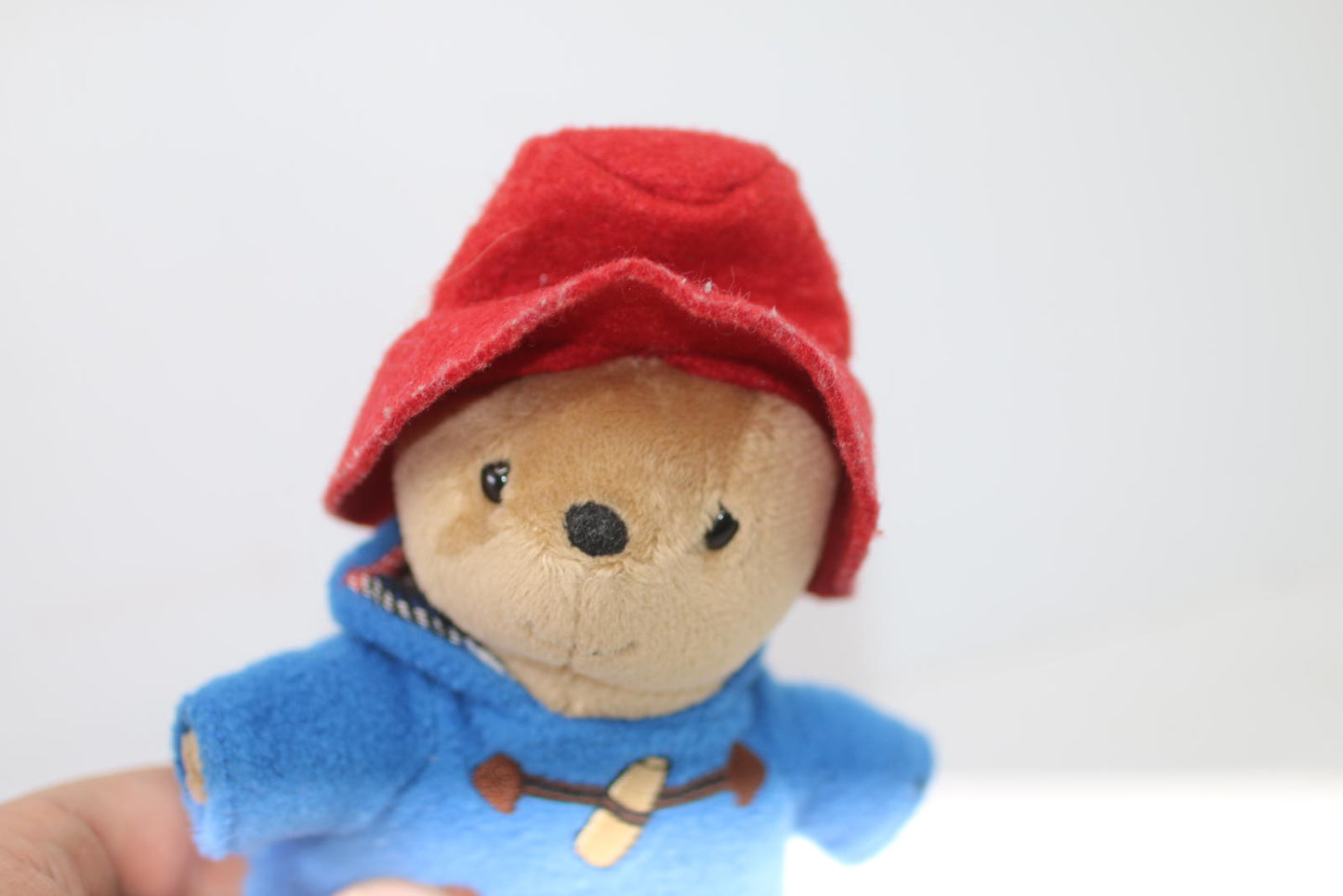 Plush Bear Toy with Blue Coat and Red Hat Rainbow