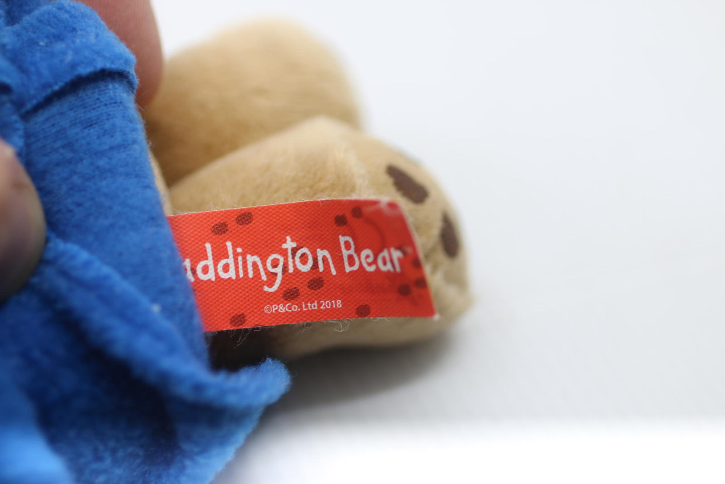 Plush Bear Toy with Blue Coat and Red Hat Rainbow