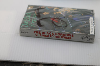 Cassette the black sorrows chained to the wheel Brand new sealed VTG