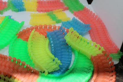 Big lot of Magic Tracks Neon Glow In The Dark Track Racing Rainbow Flexible toys