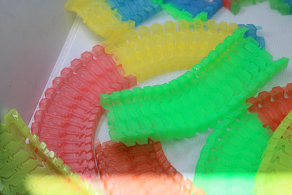 Big lot of Magic Tracks Neon Glow In The Dark Track Racing Rainbow Flexible toys