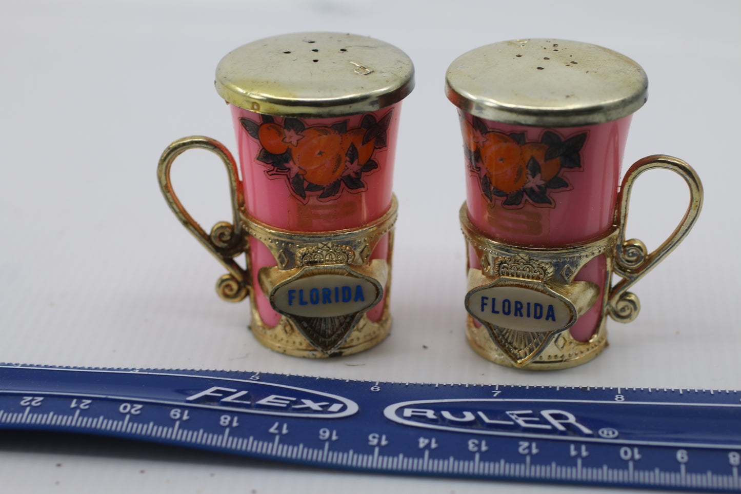 Vintage Souvenir Florida Plastic Salt and Pepper Pink & golden Shakers