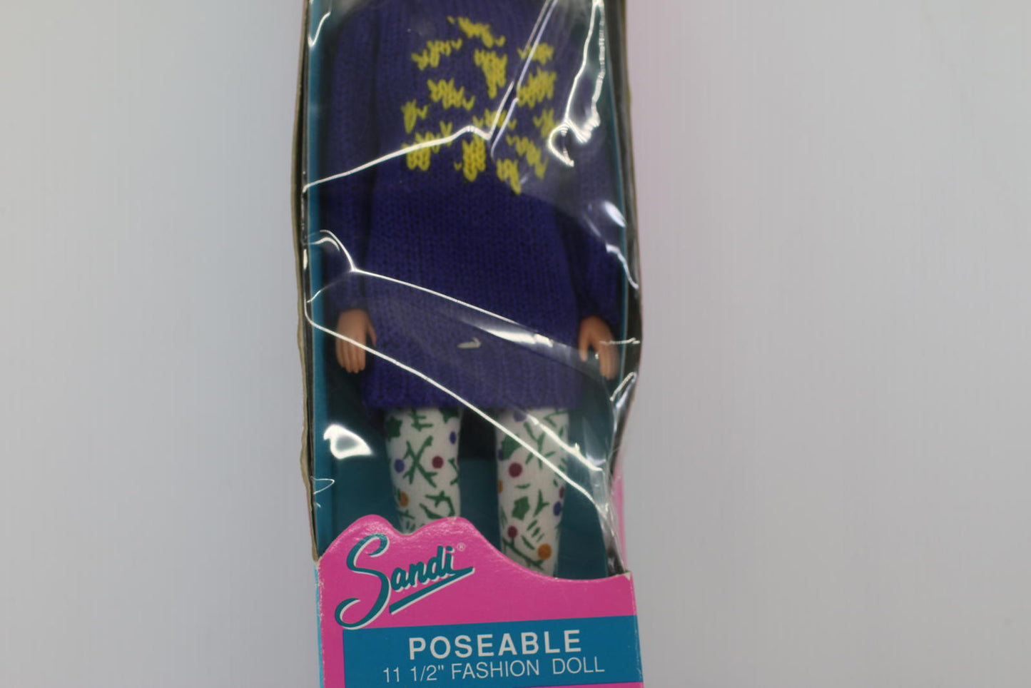 Sandi Poseable 11 1/2 Inch Fashion Doll by Totsy with a purple pull in box