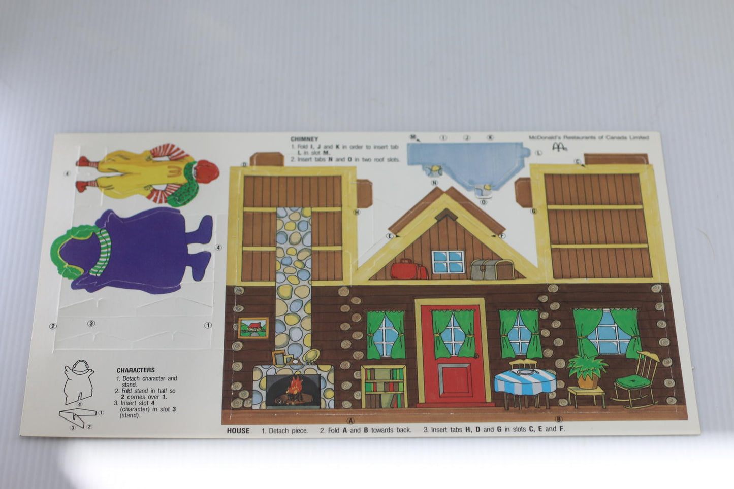 Vintage McDonald’s Ronald Grimace Christmas Cabin Punch Board playset