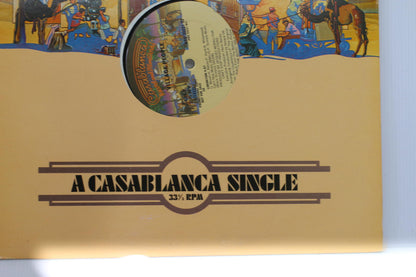 A Casablanca Single 33⅓ RPM Vinyl Record and film work