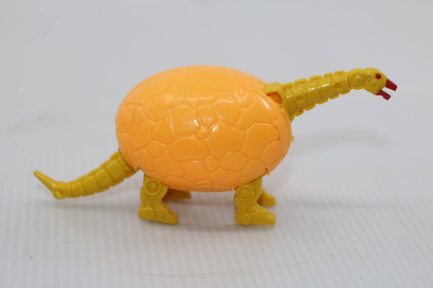 Vintage 1980s MOTU-Style Transforming Dinosaur Egg Figure – Rare Orange Variant (Bootleg)
