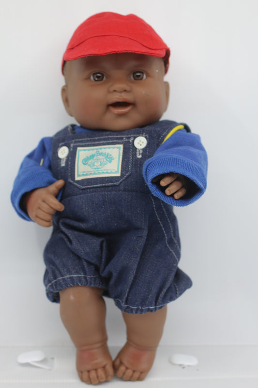 cabbage patch kids cloth on a berenguer african baby doll with red cap