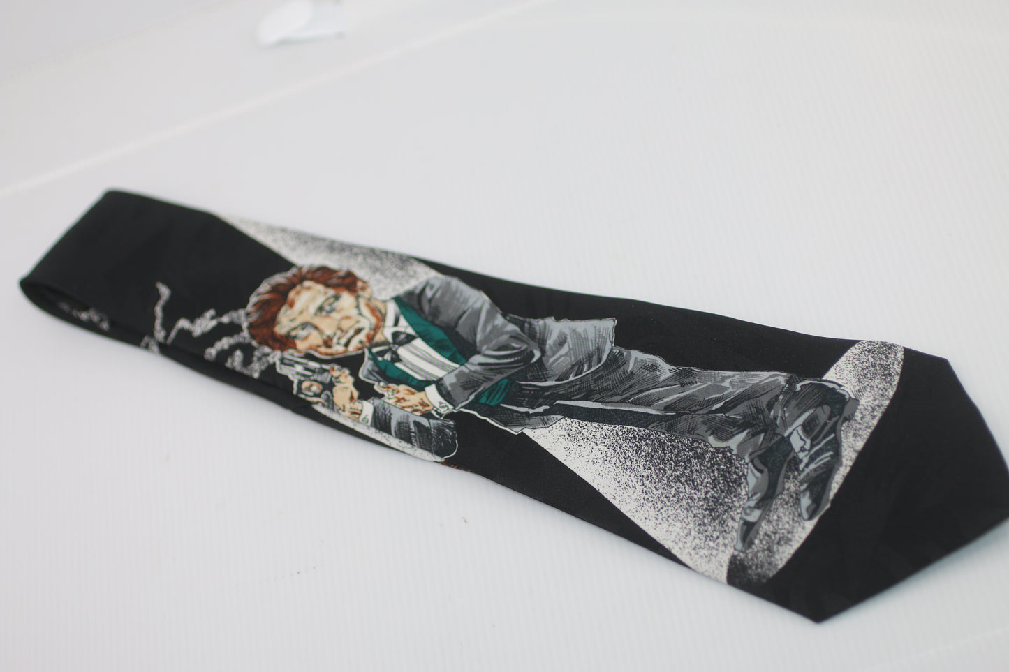 Marbella James Bond style logo drawing  on the tie