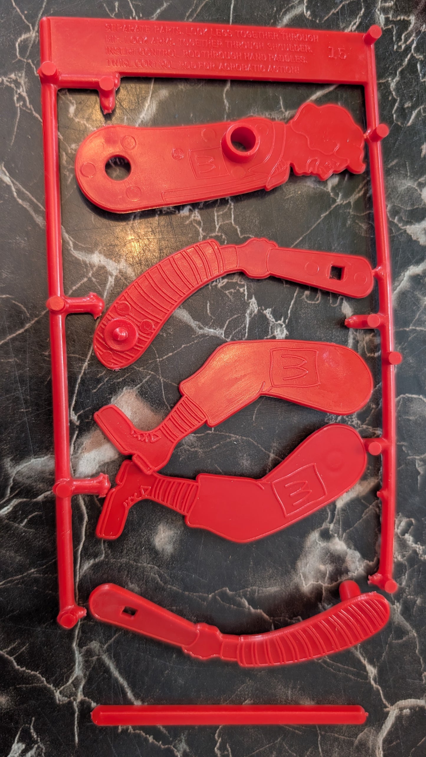McDonald’s Acrobate 1987 Canada Happy Meal Toy RED Unassembled Uncut Sprue
