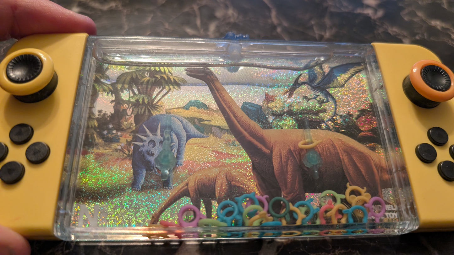 Dino World Handheld Water Ring Game Dinosaur Toy – Classic Push Button Game