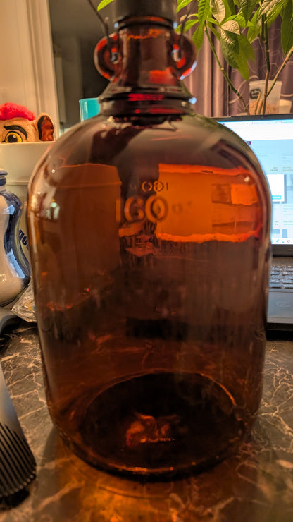 Vintage Amber Glass Jug 160 oz – Made in Canada – Wire Handle Brown Bottle